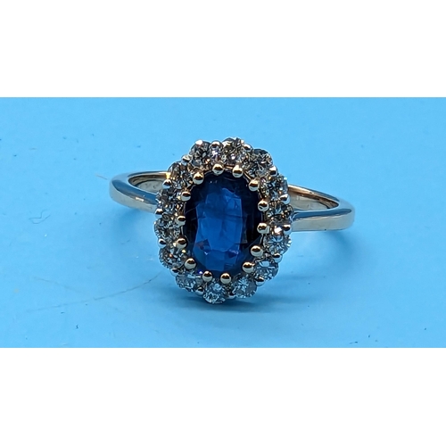 783 - 18ct rose gold oval kyanite and cluster ring.  Kyanite 1.27ct.  Diamonds 0.51ct.  Original WGI Cert.... 