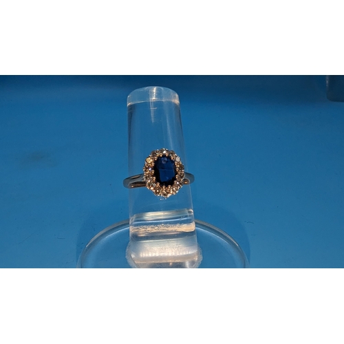 783 - 18ct rose gold oval kyanite and cluster ring.  Kyanite 1.27ct.  Diamonds 0.51ct.  Original WGI Cert.... 