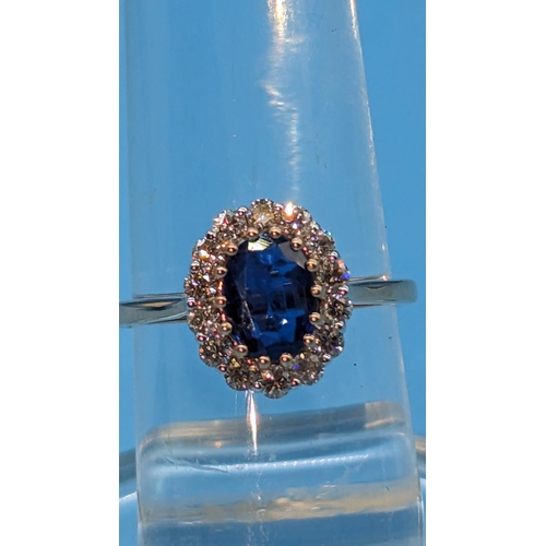 783 - 18ct rose gold oval kyanite and cluster ring.  Kyanite 1.27ct.  Diamonds 0.51ct.  Original WGI Cert.... 