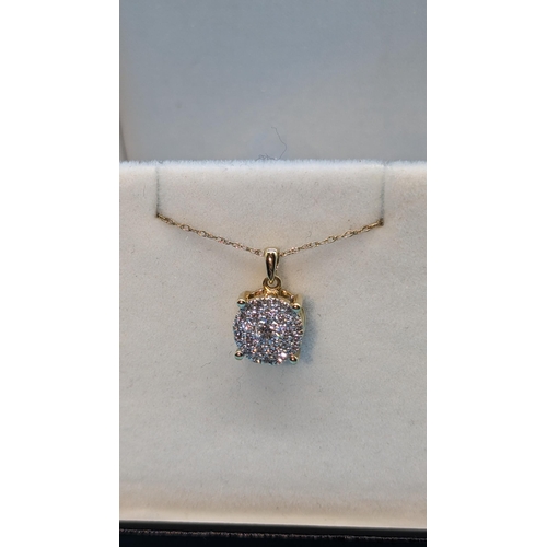 760 - 9ct yellow gold multi cluster diamond pendant on 9ct yellow gold chain. Diamonds 0.33ct. Boxed