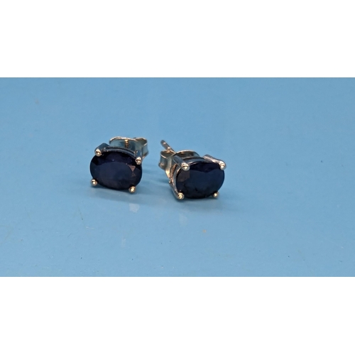 786 - Pair silver studs set with oval sapphire gemstone