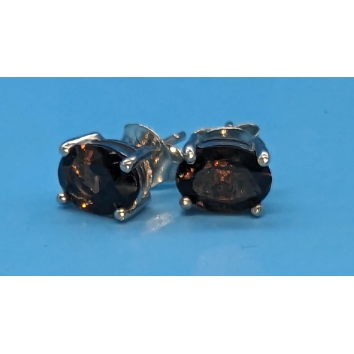 780 - Pair oval smokey quartz studs set in silver