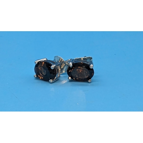 780 - Pair oval smokey quartz studs set in silver