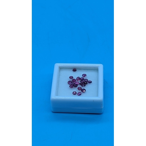 752 - A parcel of 22 loose rubies.  4.32ct total.  Boxed