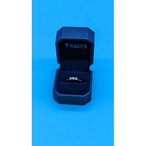 751 - 9ct white gold round brilliant cut diamond triology ring.  Diamonds 0.33ct total.  Boxed