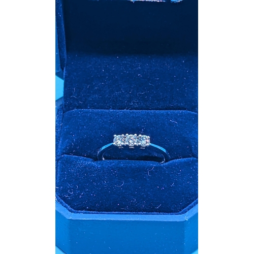 751 - 9ct white gold round brilliant cut diamond triology ring.  Diamonds 0.33ct total.  Boxed