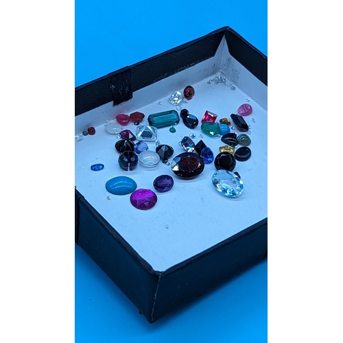 728 - Parcel of loose gemstones including emerald, sapphire, amethyst, smokey quartz, citrine, ruby, cz, g... 