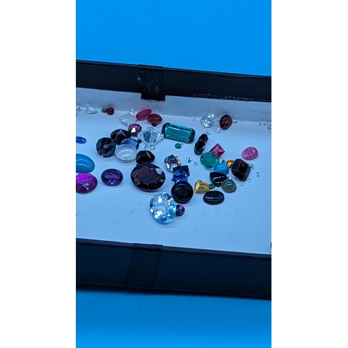 728 - Parcel of loose gemstones including emerald, sapphire, amethyst, smokey quartz, citrine, ruby, cz, g... 