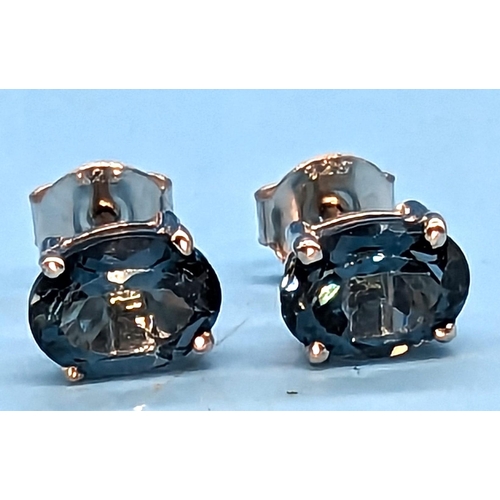 730 - Pair London blue topaz studs set in silver