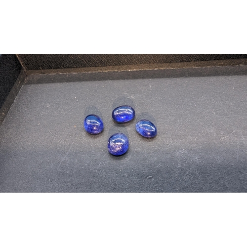 754 - Parcel of 4 cabochon sapphires, totalling 15.11ct