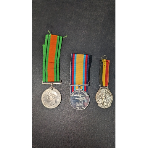 1505 - WWII Defence Medal, Gulf War Medal and another.