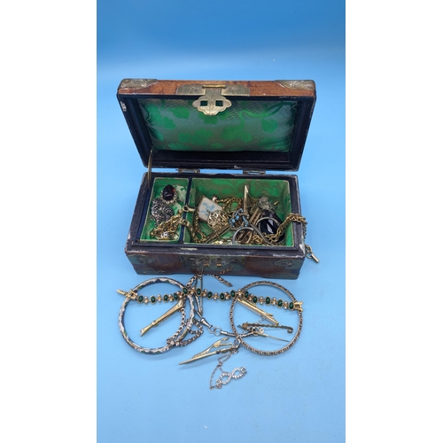 970 - An inlaid and Brass Bound Jewellery Box and Contents