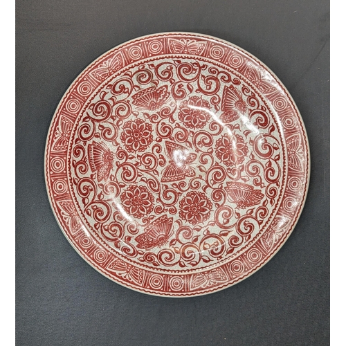 714 - A Delft Porcelain Red Crackleware Butterfly Wall Plate 38.5 cm in Diameter