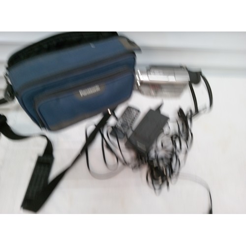 663 - Panasonic NV-DS11 Digital Video Camera with Charger and Remote.