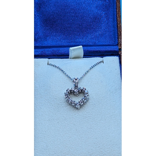 745 - 18ct White Gold Diamond Set Heart Pendant on a Silver Chain - Boxed