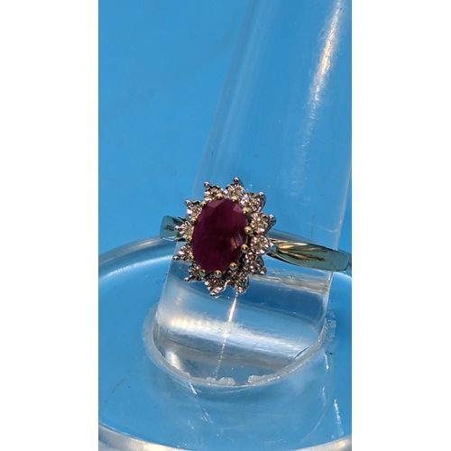 738 - 9ct Yellow Gold Ruby and Diamond Cluster Ring, Ovak Treated Ruby 0.92ct. Diamonds 0.06ct
Ring Size Q... 