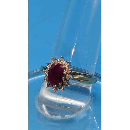 738 - 9ct Yellow Gold Ruby and Diamond Cluster Ring, Ovak Treated Ruby 0.92ct. Diamonds 0.06ct
Ring Size Q... 