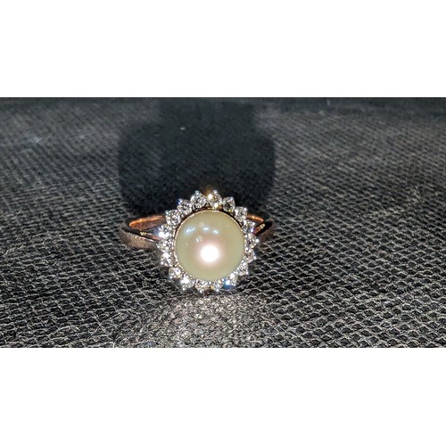 720 - 9ct Rose Gold Ring with Cultured Round Pearl and Halo of Royal Brilliant Cut Diamonds . Diamonds 0.3... 