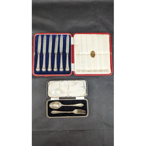 817 - A Cased Set of Silver Handled Butter Knives and Hall Marked 