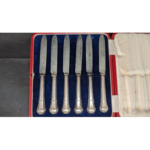 817 - A Cased Set of Silver Handled Butter Knives and Hall Marked 