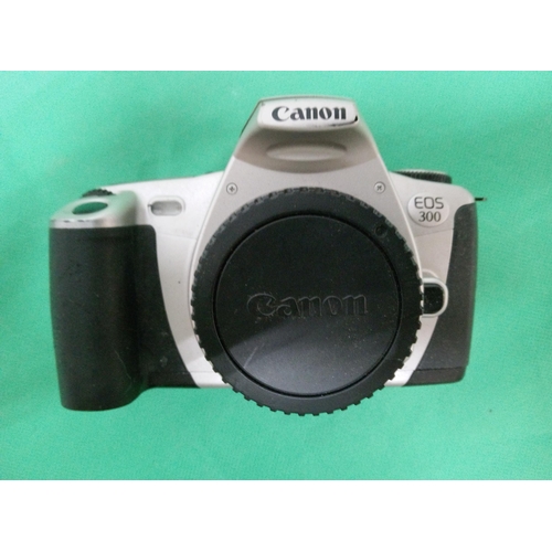 684 - Canon EOS 300, Canon EOS 700 and Konica 80 Super Zoom Camera.