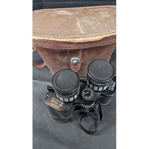 693 - A Pair of 8X - 17 x 40 Everlite Binoculars