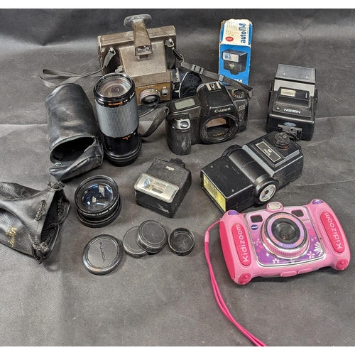 678B - An Assortment of Cameras, Flash Guns and Lenses