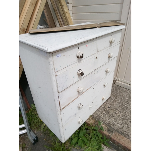 72 - A White Painted 2 over 3 Chest Of Drawers in need of restoration.