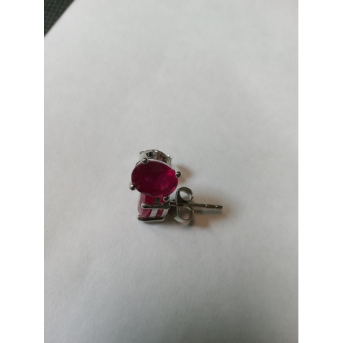 739 - A Pair of Ruby Studs Set in Silver