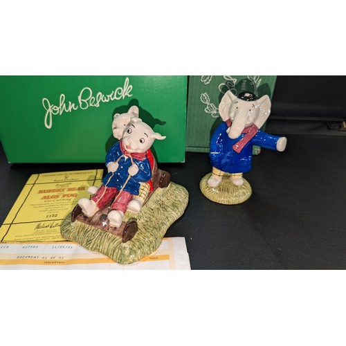 869 - 2 x John Beswick Rupert Bear figurines: Rupert Bear and Algy Pug Go Go Carting and Edward Trunk Show... 