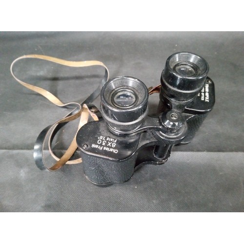 694 - A Pair of Charles Frank 8 x 30 Field 7.5 Binoculars.