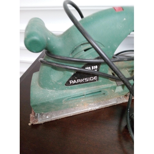 179 - Black and Decker Wallpaper Stripper with a Parkside Circular Saw and Sander.