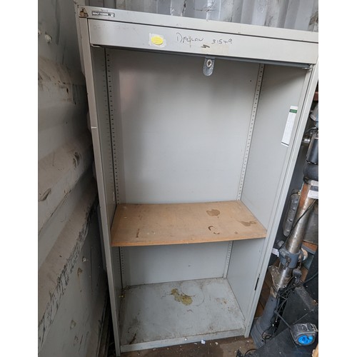 296 - A Metal Framed Storage Cabinet/ Stationary Cupboard with Roller Door