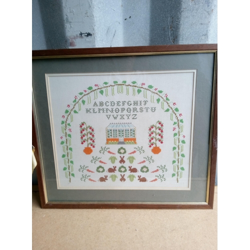 484 - A Cross Stitch Sampler, 50cm x 45cm.