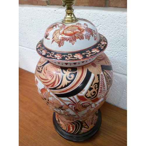 602 - A Chinese Style Lamp with Wooden Base 52cm H.