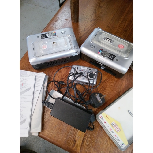 223A - 2 Kodak Easy Share Systems with Instructions and a Kodak Easy Share Camera and Power Leads.
Spares/R... 