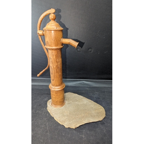 1241 - A Handmade Wooden Pump Ornament. 36cm Tall.