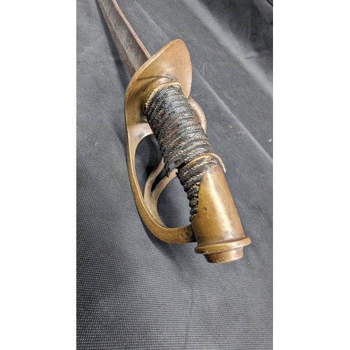 821 - A 19th Century French Model 1822 Light Cavalry Sabre with a Curved 75cm Blade Marked Soligen. Regula... 