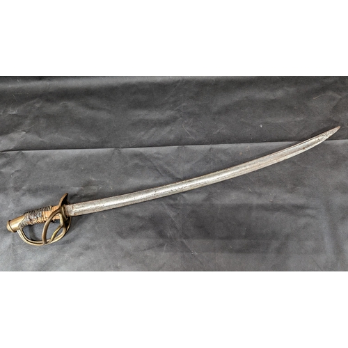 821 - A 19th Century French Model 1822 Light Cavalry Sabre with a Curved 75cm Blade Marked Soligen. Regula... 