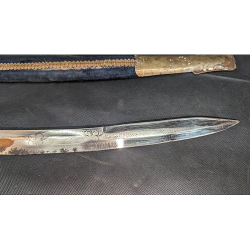 820 - An Indian Replica Sabre. Blade 66cm.