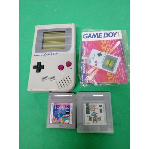 312 - Nintendo GameBoy with Tetris and Olympic Summer Games.