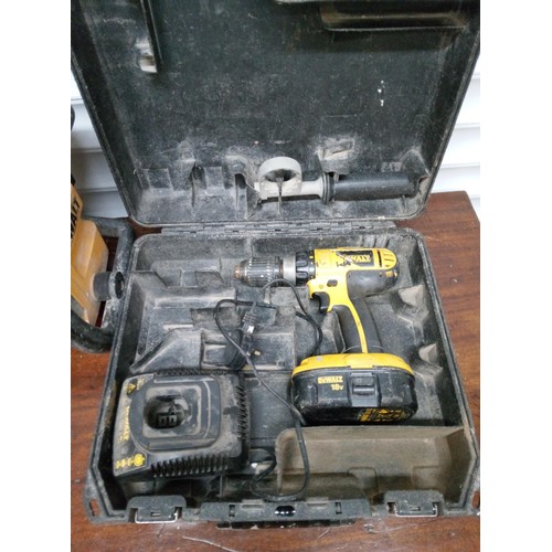 96 - A Dewalt Drill and Charger and Dewalt Radio. Untested.