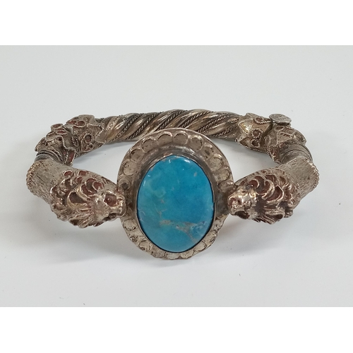 524 - An 900. Silver and Turquoise Ethnic Silver Brooch With hinged clasp.