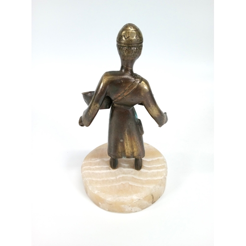 651 - A Bronze Figure of an Arabian Merchant. On Base. 16cm.