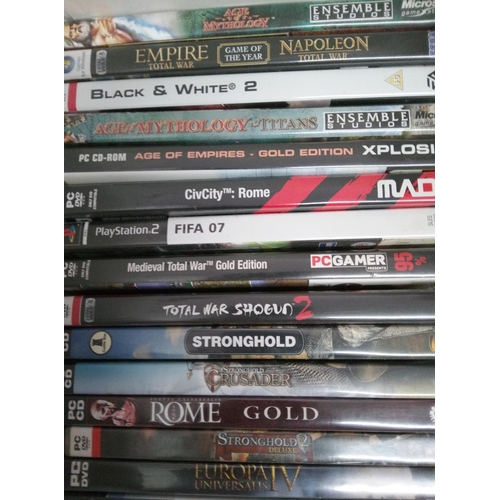 313 - A Selection of PC DVDs and 3 Playstation 2 games. 23 In Total.