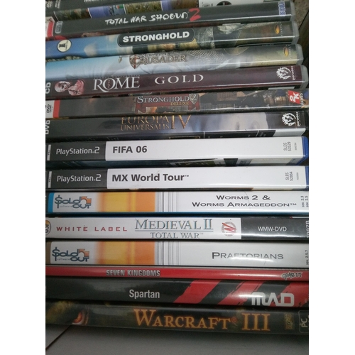 313 - A Selection of PC DVDs and 3 Playstation 2 games. 23 In Total.