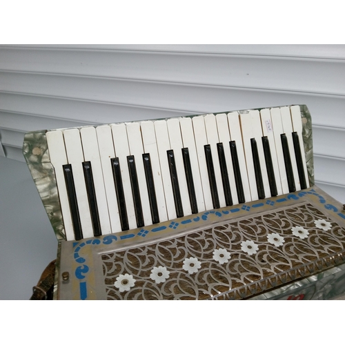 212 - Geraldo Accordion with Decorative Floral Design.