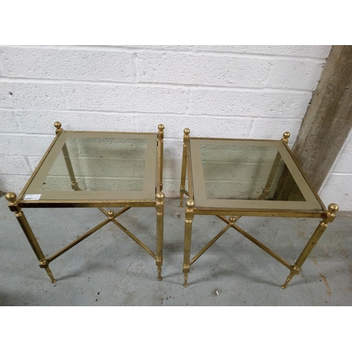 801 - A Pair of Brass and Glass Side Tables.