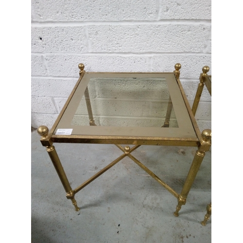 801 - A Pair of Brass and Glass Side Tables.