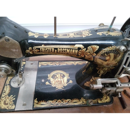 205 - Frister and Rossman Sewing Machine. Key missing but unlocked.